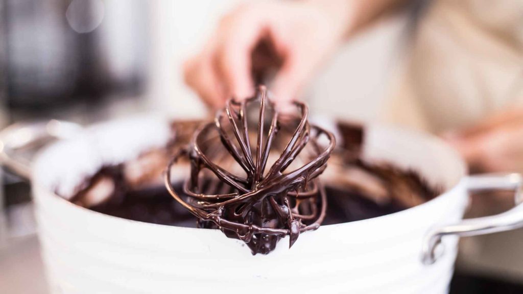 A chocolatier is a career in chocolate processing that works with melted chocolate.